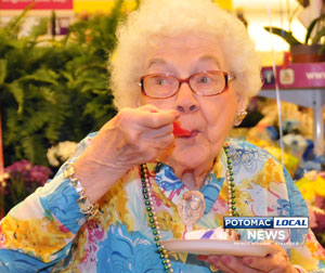 Doris Woodring, 103, celebrated her birthday at a special surprise party at her favorite local grocery, Giant Food, where she enjoyed birthday cake. [Mary Davidson / Potomac Local News]