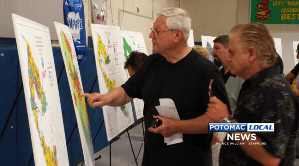 Allen Whetzel and Richard Geyer, of Nokesville, examine early findings of a new study of Prince William County’s Rural Crescent land. [Uriah Kiser / Potomac Local News]