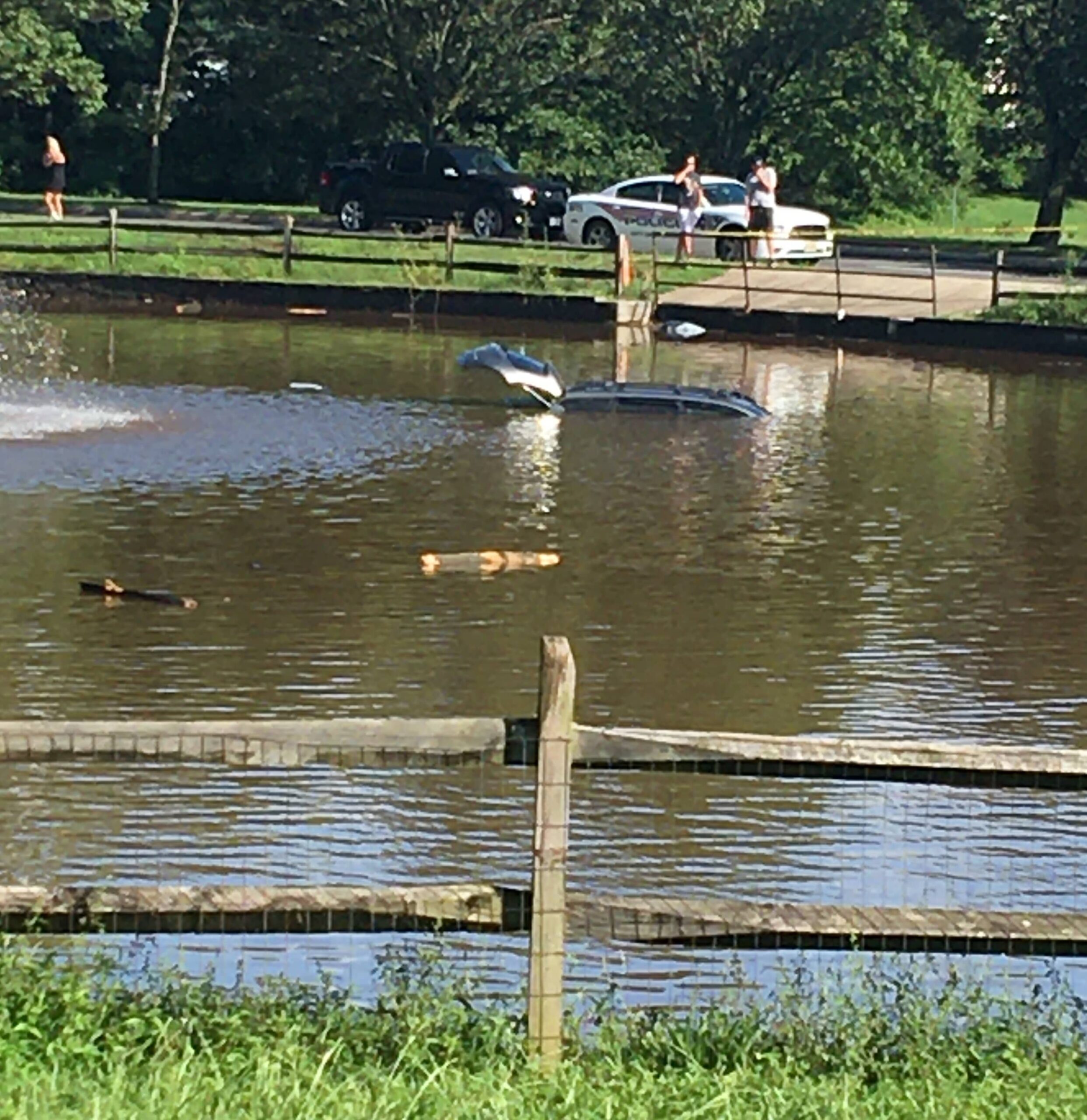 SUV crashes into Manassas pond