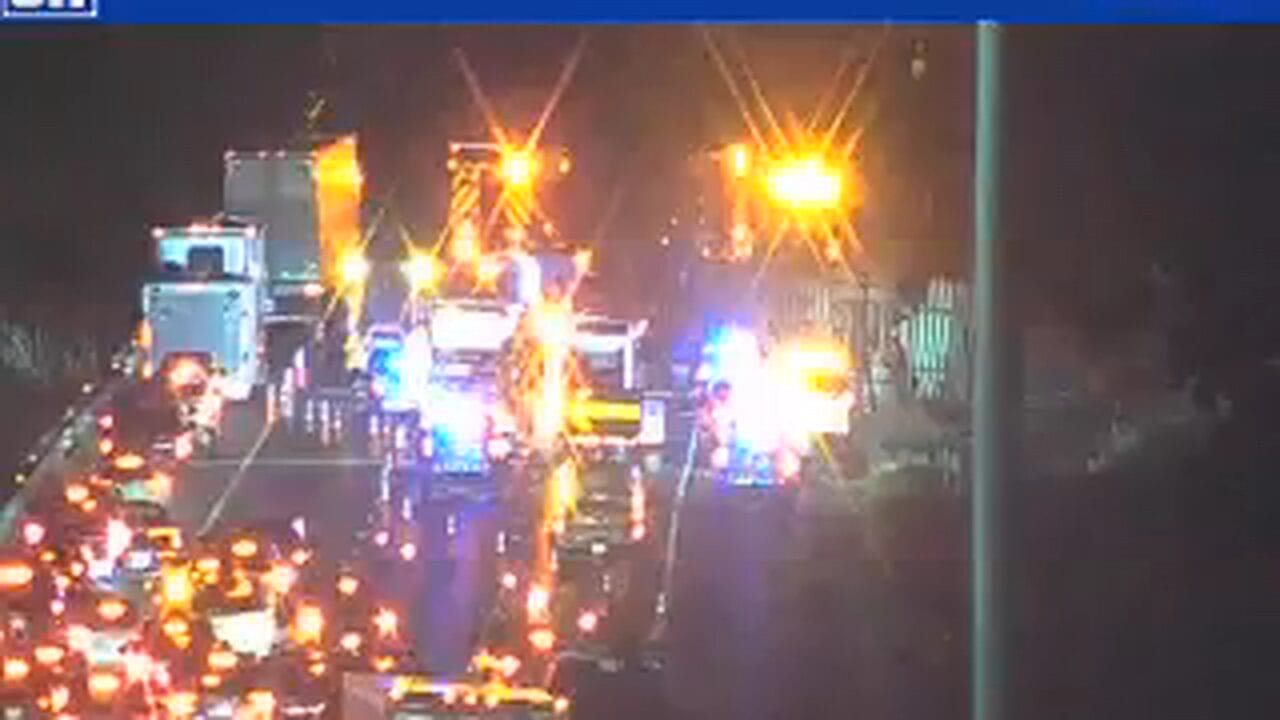 Emergency lights and backed-up traffic on I-95 near mile marker 146 in Stafford County