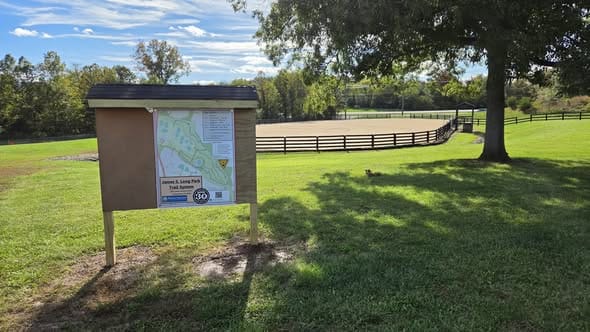 Trailhead kiosk with map at James Long Park