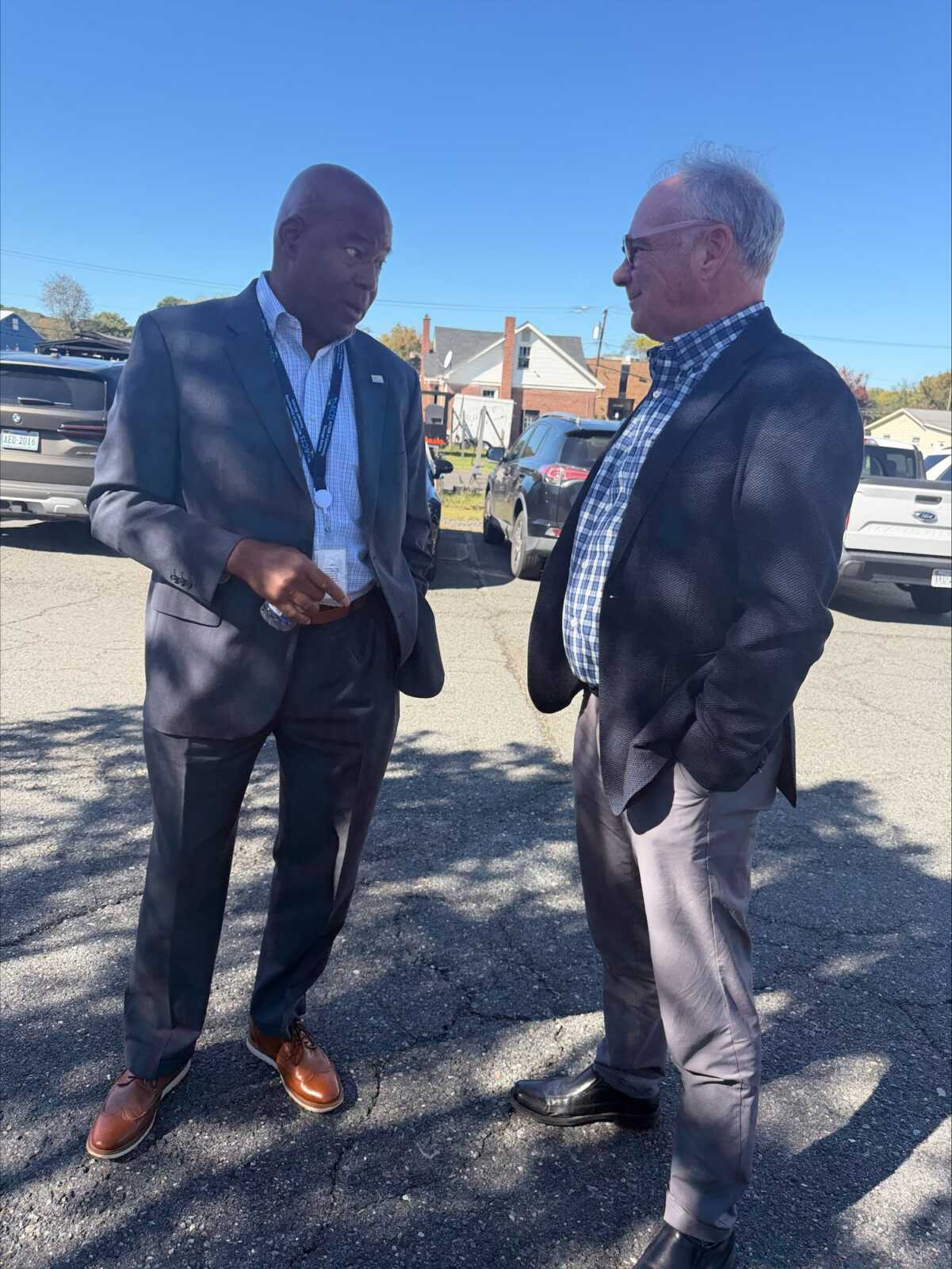 Sen. Tim Kaine talks with a guest at ACTS